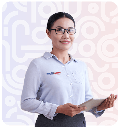 logi5 A financial outsourcing services executive drinks coffee by the window.